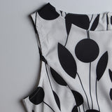 1950s White and Black Sleeveless Retro Polka Dot Belted Vintage Dress