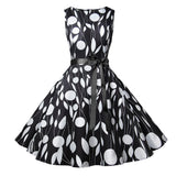 1950s White and Black Sleeveless Retro Polka Dot Belted Vintage Dress