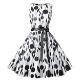 1950s White and Black Sleeveless Retro Polka Dot Belted Vintage Dress