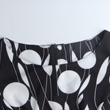 1950s White and Black Sleeveless Retro Polka Dot Belted Vintage Dress