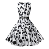 1950s White and Black Sleeveless Retro Polka Dot Belted Vintage Dress